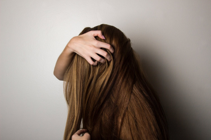 a woman with long brown hair